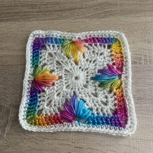 Crocheted Rainbow and White Granny Square Starter